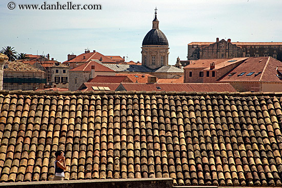 man-photographing-rooftops.jpg