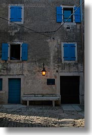 cobblestones, croatia, europe, groznjan, lamp posts, materials, stones, vertical, windows, photograph