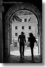 arches, archways, black and white, couples, croatia, europe, korcula, silhouettes, under, vertical, photograph