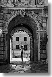 arches, archways, black and white, croatia, europe, korcula, people, silhouettes, under, vertical, womens, photograph