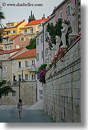 croatia, europe, korcula, statues, vertical, walking, womens, photograph