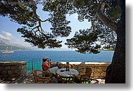 cafes, croatia, europe, horizontal, korcula, ocean, scenics, shade tree, viewing, womens, photograph