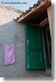 croatia, doors, europe, green, lubenice, pink, towels, vertical, photograph