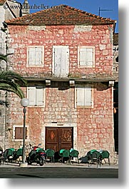 buildings, chairs, croatia, europe, green, milna, pink, vertical, photograph