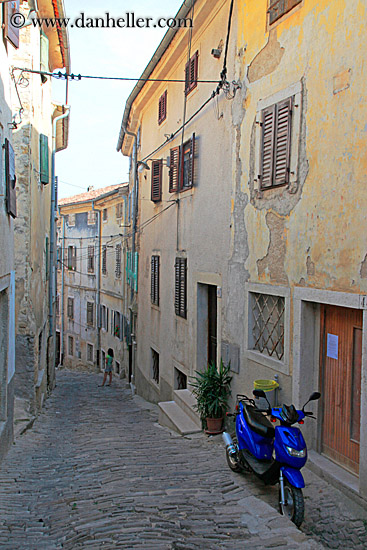 blue-moped-on-narrow-street.jpg