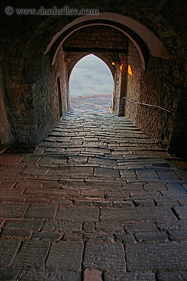 cobblestone-road-thru-gothic-archway.jpg