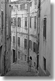 black and white, cobblestones, croatia, europe, girls, materials, motovun, narrow streets, stones, streets, towns, vertical, photograph
