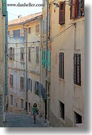 cobblestones, croatia, europe, girls, materials, motovun, narrow streets, stones, streets, towns, vertical, photograph