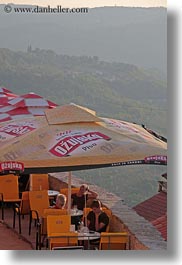 croatia, europe, motovun, towns, umbrellas, vertical, womens, photograph