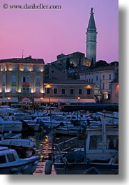 bell towers, boats, buildings, croatia, dusk, europe, glow, harbor, lights, nature, rovinj, sky, structures, sun, sunsets, towers, transportation, vertical, photograph