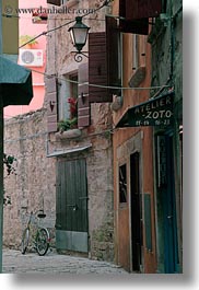 bicycles, cobblestones, croatia, europe, materials, narrow, narrow streets, rovinj, stones, streets, vertical, photograph