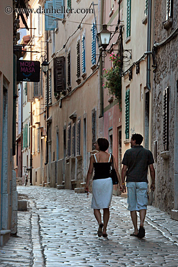 couple-walking-on-cobblestone-street-4.jpg