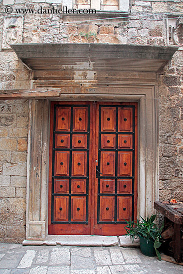 wood-door-in-ornate-frame.jpg