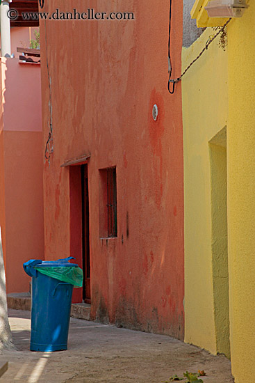 blue-trashcan-n-orange-wall-1.jpg