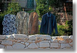 croatia, europe, hangings, horizontal, shirts, stones, veli losinj, walls, photograph