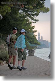 images/Europe/Croatia/WtGroupIstria2009/HelenePatrick/helene-n-patrick-walking-by-bell_tower-1.jpg