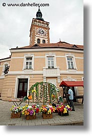 clocks, czech republic, europe, flowers, mikulov, towers, vertical, photograph