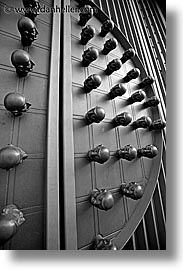 arts, black and white, czech republic, europe, heads, knobs, prague, vertical, photograph