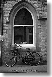 bicycles, black and white, cambridge, england, english, europe, streets, united kingdom, vertical, photograph