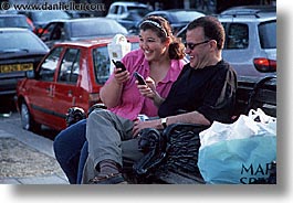 cellphone, cities, couples, england, english, europe, horizontal, london, people, united kingdom, photograph