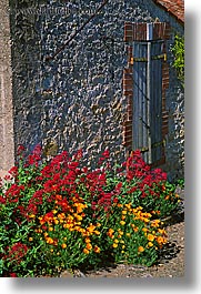 europe, flowers, france, la baule, stones, vertical, walls, photograph