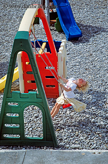girl-on-colored-swings.jpg