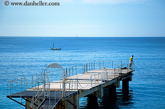 man-fishing-on-pier.jpg
