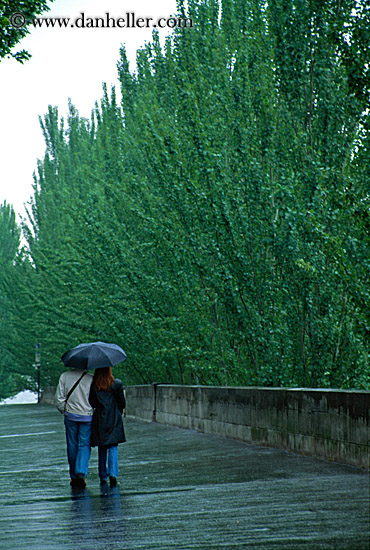 couple-walking-w-umbrella-2.jpg