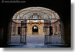 aix en provence, archways, buildings, city hall, cobblestones, entry, europe, france, gates, horizontal, irons, materials, provence, silhouettes, structures, photograph