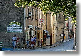 branches, europe, fayence, france, groups, horizontal, nature, pedestrians, people, plants, provence, shady, streets, trees, photograph