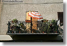 balconies, europe, fayence, france, horizontal, provence, umbrellas, photograph