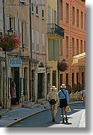buildings, couples, europe, france, grasse, narrow, people, provence, streets, structures, tourists, vertical, photograph