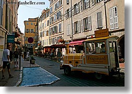 buildings, europe, france, grasse, horizontal, provence, structures, tourists, trains, yellow, photograph