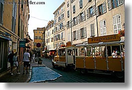 buildings, europe, france, grasse, horizontal, provence, structures, tourists, trains, yellow, photograph