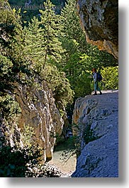 activities, europe, france, hikers, hiking, nature, overhang, people, plants, provence, trees, vertical, photograph