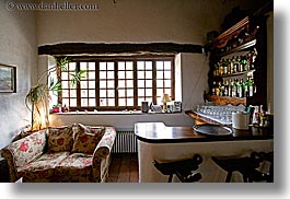 bars, europe, foods, france, horizontal, moulin de camandoule, provence, sofa, windows, wine bottle, photograph