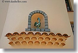 arches, archways, ceramics, europe, france, horizontal, moulin de camandoule, provence, rooster, structures, photograph