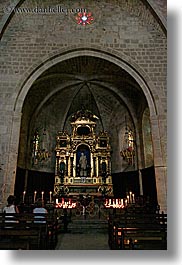 altar, buildings, candles, churches, europe, france, materials, monestaries, moustiers, notre dame de beauvoir, provence, religious, st marie, stones, structures, vertical, photograph