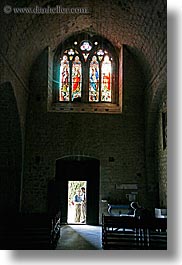 buildings, churches, entrance, europe, france, materials, monestaries, moustiers, notre dame de beauvoir, provence, religious, st marie, stained glass, stones, structures, vertical, photograph