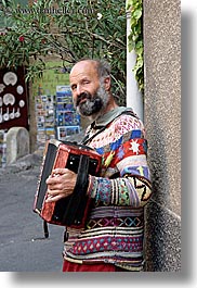 accordion, bald, beards, colors, emotions, europe, france, happy, men, moustiers, people, players, provence, red, st marie, vertical, photograph