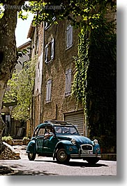 blues, buildings, cars, colors, covered, europe, france, green, ivy, nature, old, plants, provence, seillans, vertical, photograph