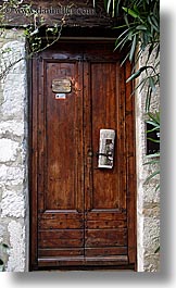 browns, colors, doors, europe, france, newspaper, provence, st paul, vertical, photograph
