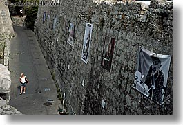 banners, europe, france, horizontal, materials, people, provence, st paul, stones, walking, womens, photograph
