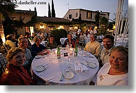 dinner, dusk, europe, foods, france, groups, horizontal, outdoors, people, provence, tables, wine glass, womens, photograph