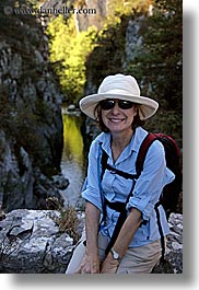 backpack, blues, clothes, colors, emotions, europe, france, groups, happy, hats, helanie, helanie howard greene, people, provence, sunglasses, vertical, womens, photograph