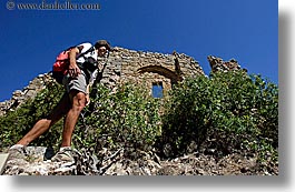 activities, architectural ruins, backpack, buildings, clothes, europe, france, groups, hiking, horizontal, men, nicos, people, provence, structures, sunglasses, photograph