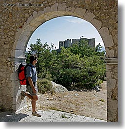 arches, archways, backpack, clothes, colors, europe, france, groups, men, nicos, people, provence, red, square format, structures, photograph