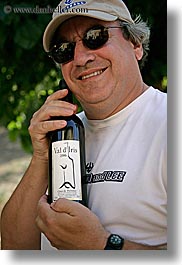 clothes, emotions, europe, foods, france, groups, happy, hats, men, people, provence, red wine, richard, richard felicia, romantic, senior citizen, sunglasses, vertical, wine bottle, wines, photograph