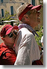 clothes, colors, conceptual, couples, diane, emotions, europe, france, groups, hats, hugging, men, people, provence, red, romantic, sunglasses, tom, tom diane smith, vertical, womens, photograph