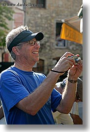 artists, blues, cameras, clothes, colors, emotions, europe, france, glasses, groups, happy, hats, men, people, photographers, provence, taking, tom diane smith, vertical, photograph